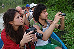 Ramiel and Nicole in a canoe in Tortuguero National Park © by OA:modio
